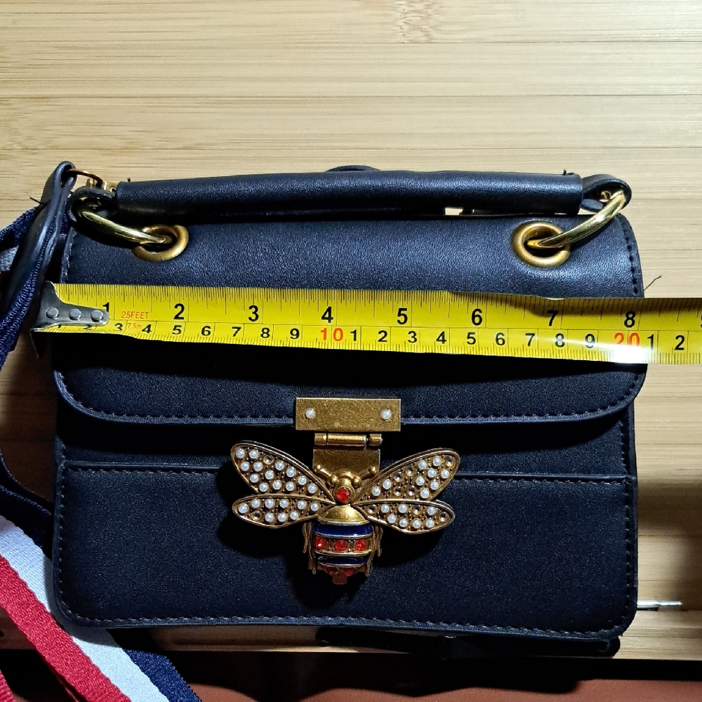 Elegant Black Designer Handbag with Gold Bee Accent